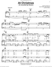 Cover icon of At Christmas sheet music for voice, piano or guitar by isaac Hanson, Taylor Hanson and Zachary Hanson, intermediate skill level