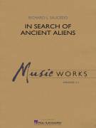 Cover icon of In Search of Ancient Aliens (COMPLETE) sheet music for concert band by Richard L. Saucedo, intermediate skill level