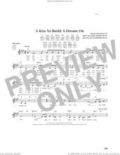 Cover icon of A Kiss To Build A Dream On (from The Daily Ukulele) (arr. Jim Beloff) sheet music for ukulele by Louis Armstrong, Jim Beloff, Bert Kalmar, Harry Ruby and Oscar II Hammerstein, intermediate skill level