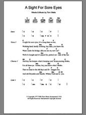 Cover icon of A Sight For Sore Eyes sheet music for guitar (chords) by Tom Waits, intermediate skill level