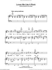 Cover icon of Loves Me Like A Rock sheet music for voice, piano or guitar by Paul Simon, intermediate skill level