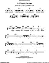Cover icon of A Woman In Love sheet music for piano solo (chords, lyrics, melody) by Barbra Streisand, Barry Gibb and Robin Gibb, intermediate piano (chords, lyrics, melody)