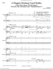 Cover icon of Muppet Christmas Carol Medley (from The Muppet Christmas Carol) (COMPLETE) sheet music for orchestra/band by Paul Williams, intermediate skill level