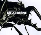 Cover icon of Man Next Door sheet music for voice, piano or guitar by Massive Attack, intermediate skill level
