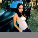 Cover icon of In The Dark sheet music for voice, piano or guitar by Norah Jones and Jools Holland, intermediate skill level