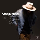 Cover icon of Wounds sheet music for voice, piano or guitar by Jordan Feliz, Colby Wedgeworth and Paul Duncan, intermediate skill level